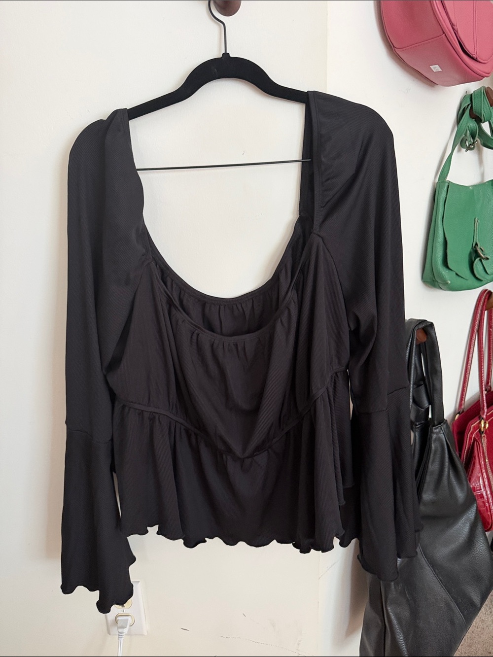Cider Black Scoop-Neck Long Sleeve Ruffle Hem Top